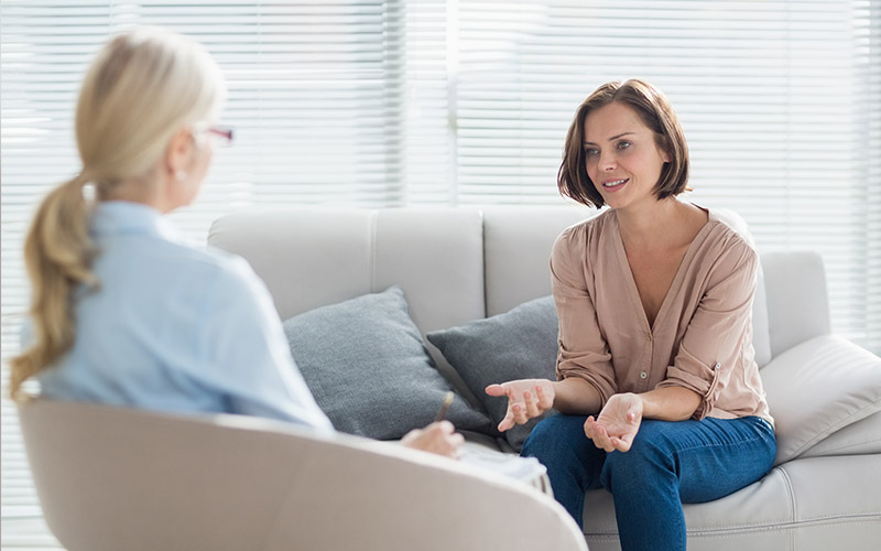 Psychiatrist with patient