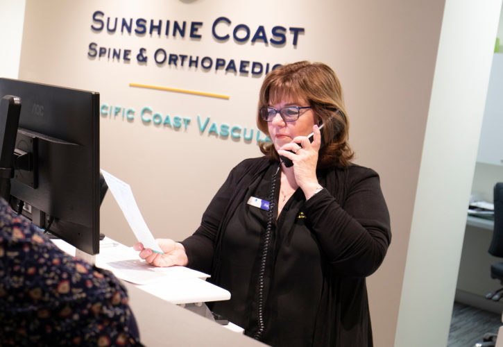 Receptionist calling patient who missed their appointment