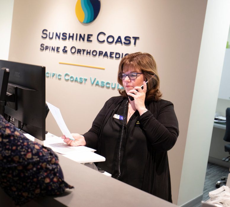 Receptionist calling patient who missed their appointment