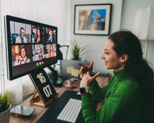 Businesspeople discussing business on virtual staff meeting during pandemic